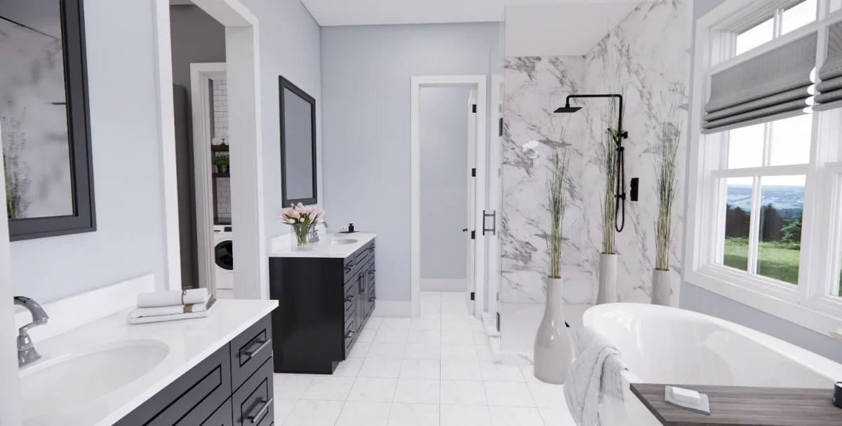 Spacious Bathroom with Luxurious Marble Accents and a Freestanding Tub