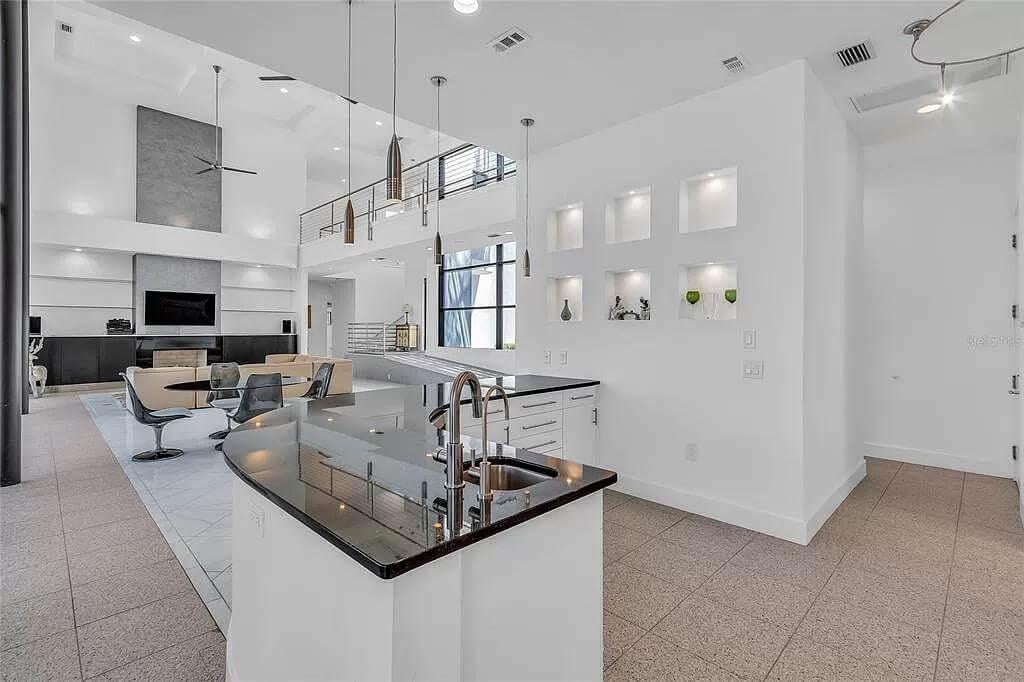 Check Out the Dramatic Two-Story Living Room with Open Loft