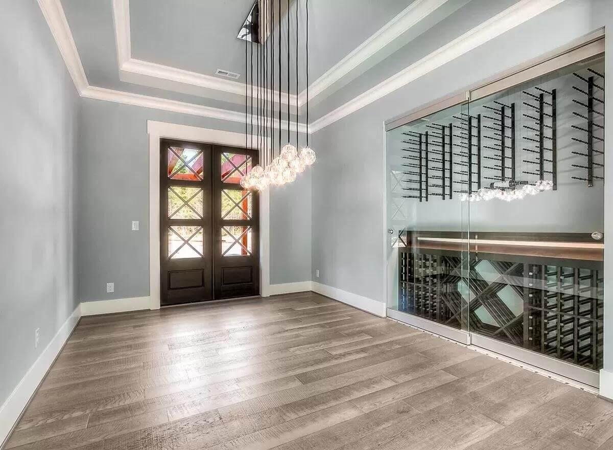 Wow, Look at That Stunning Chandelier in This Luxurious Wine Room