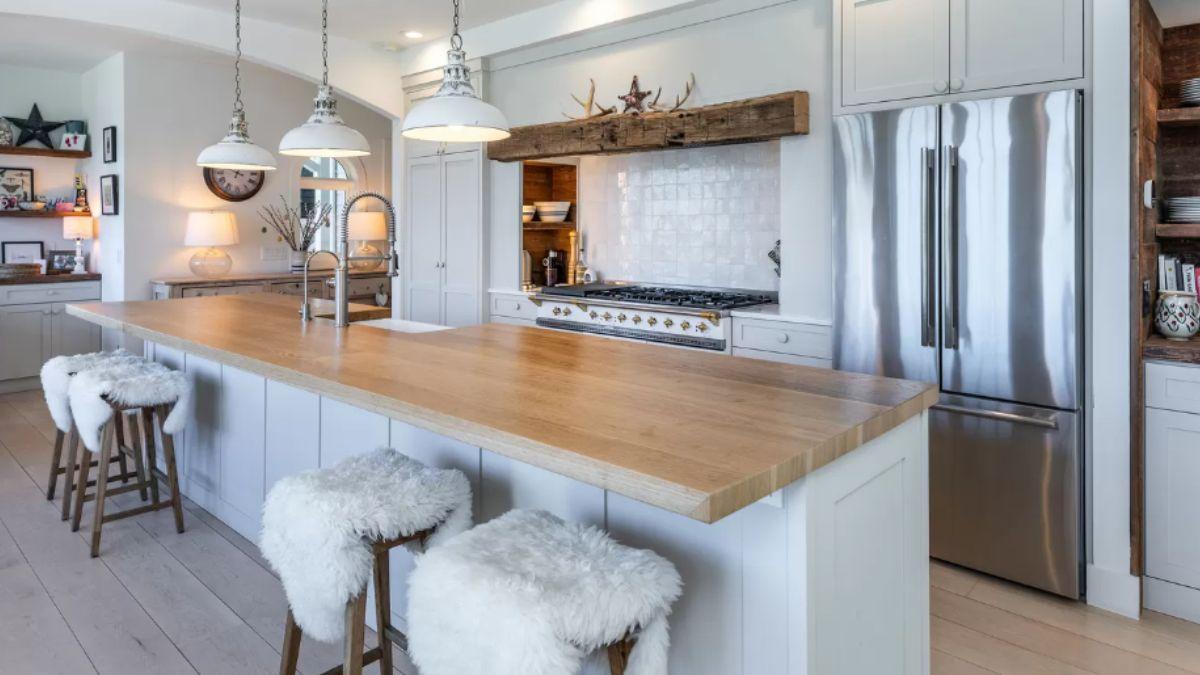 Check Out This Spacious Kitchen Island with Cozy Sheepskin Stools