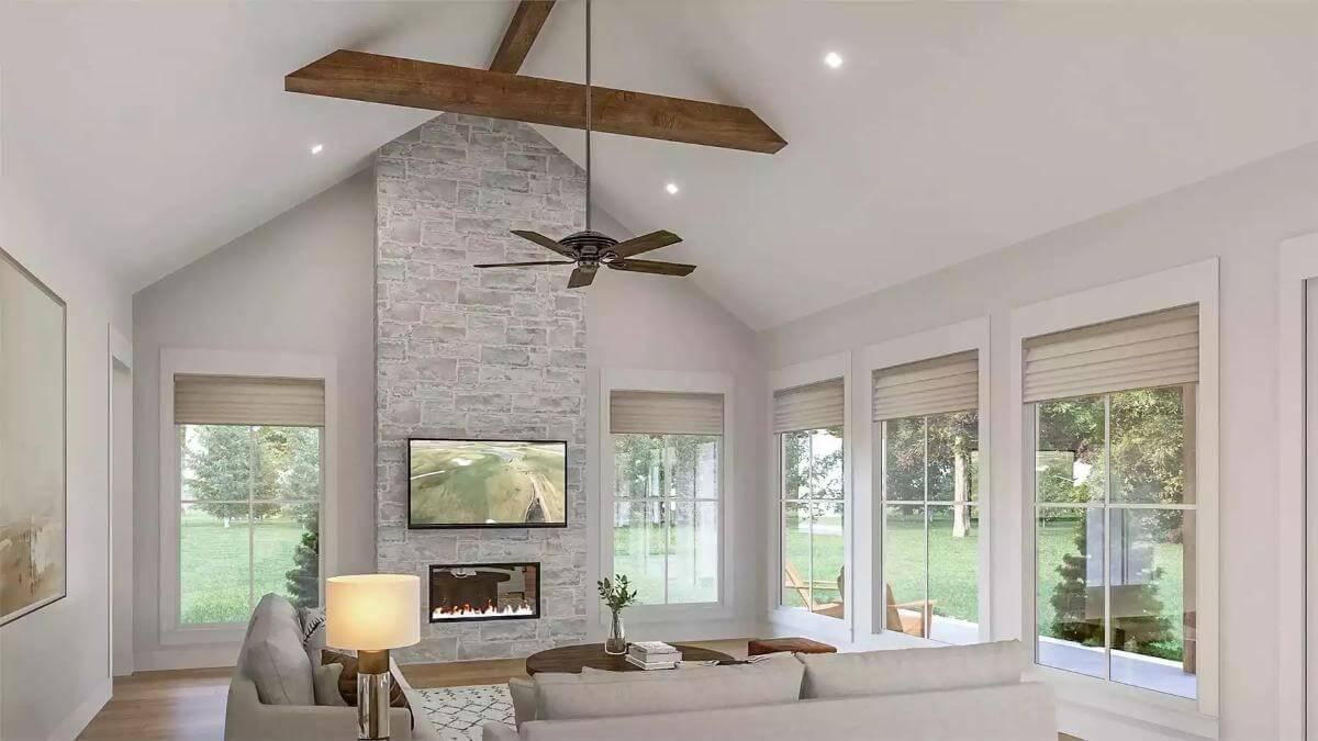 Vaulted Ceiling and Stone Fireplace Create a Cozy Living Space