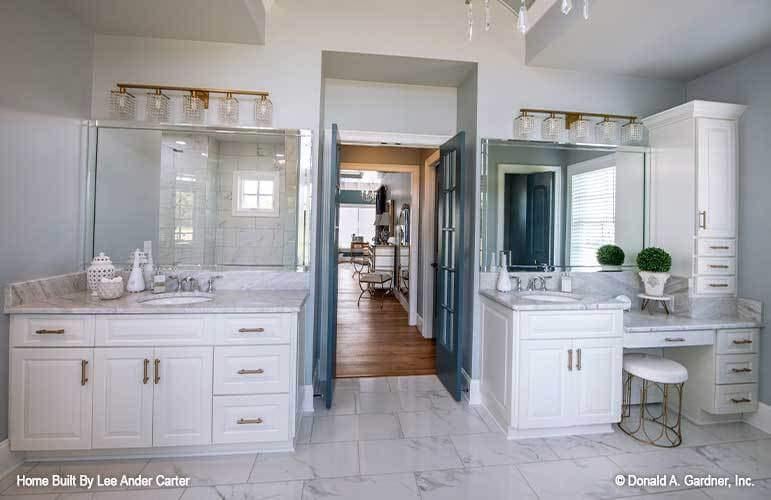 Sophisticated Craftsman Bathroom with Dual Vanities and Marble Accents