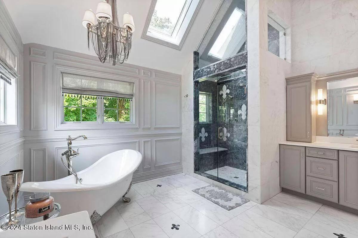 Wow, Check Out This Freestanding Tub Under Skylights