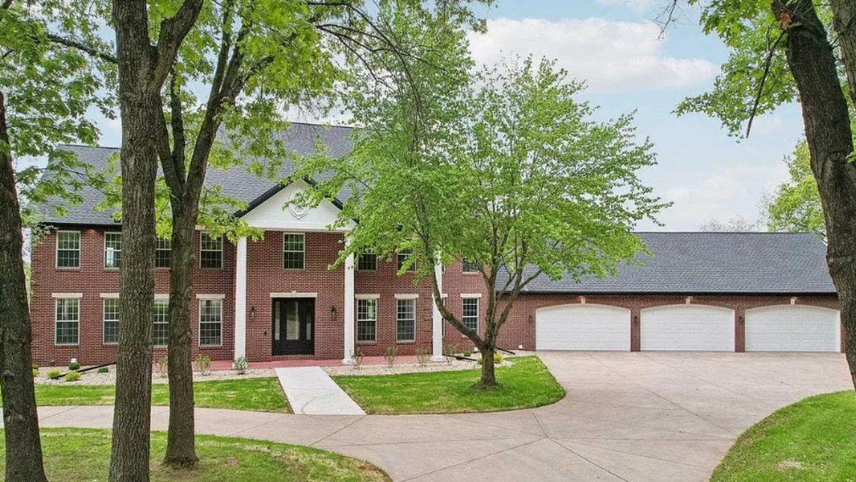 Grand Brick Home with Impressive Four-Car Garage