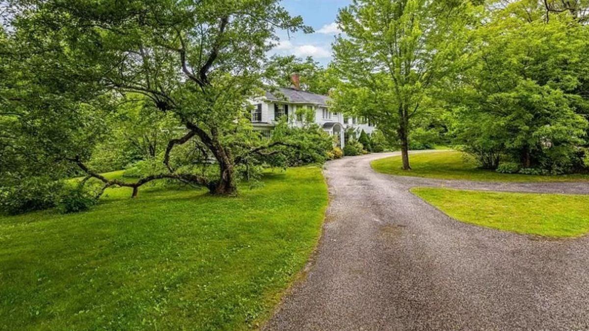 Winding Driveway Leads to Storybook Colonial
