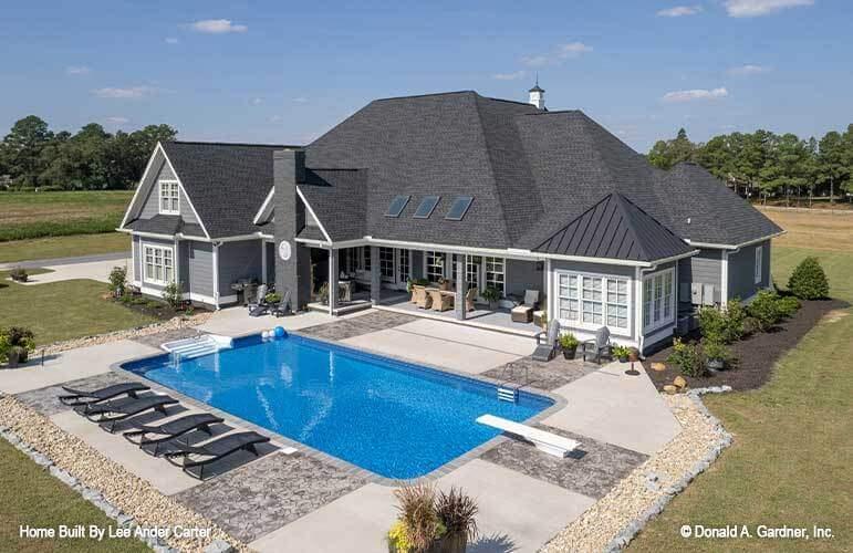 Check Out the Expansive Poolside Living with Craftsman Charm