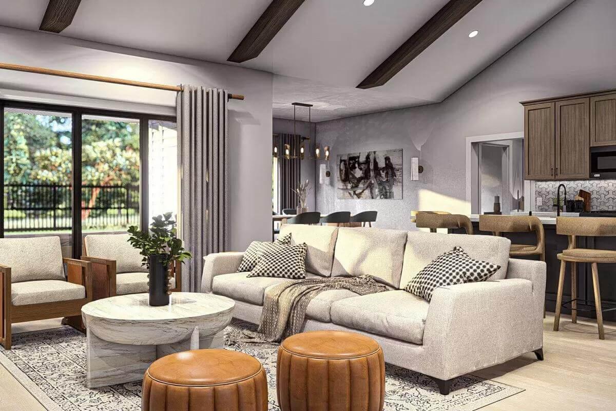 Open Living Room Featuring Exposed Beams and Cozy Seating