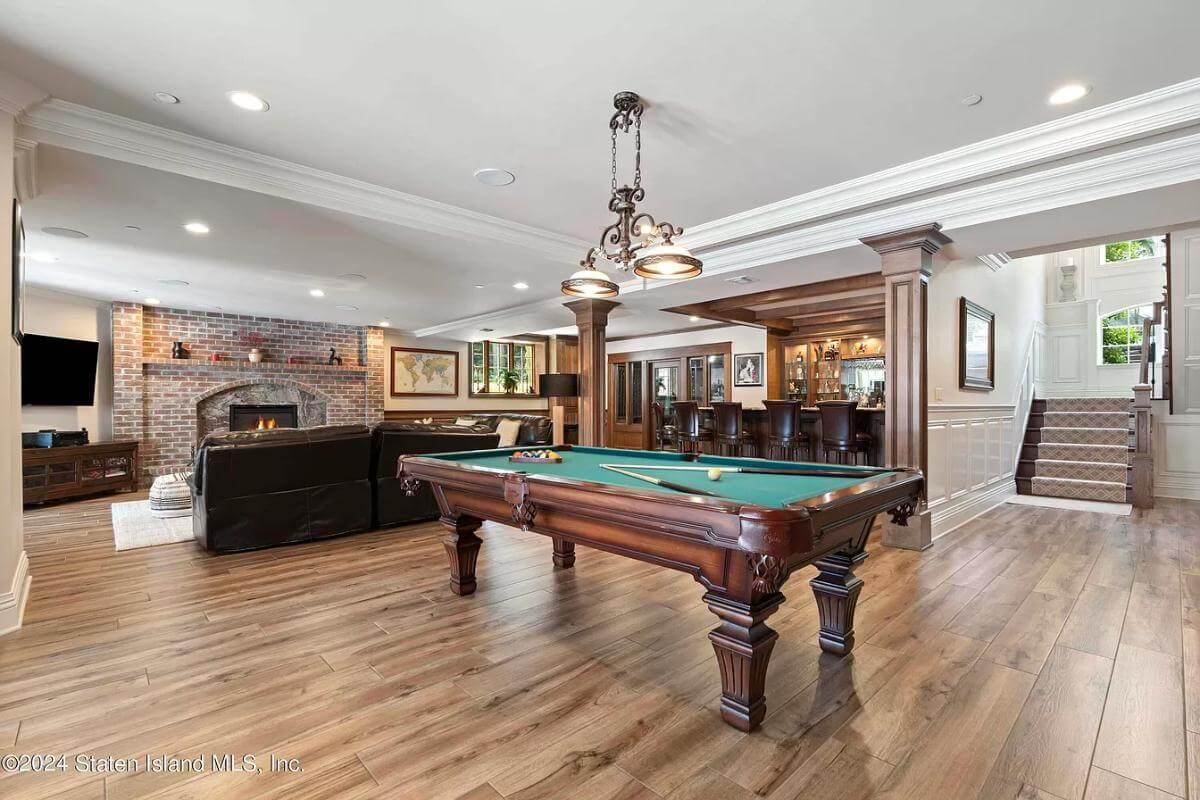 Wow, Check Out the Billiard Table and Brick Fireplace in This Entertainer