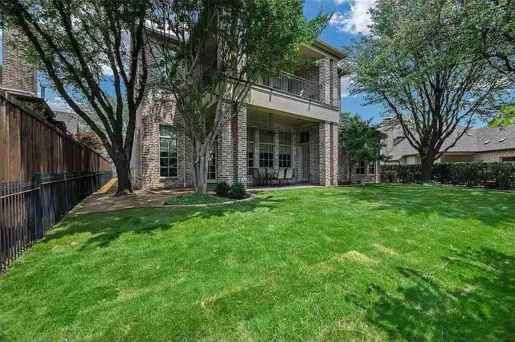 Check Out This Backyard Oasis with a Brick Patio