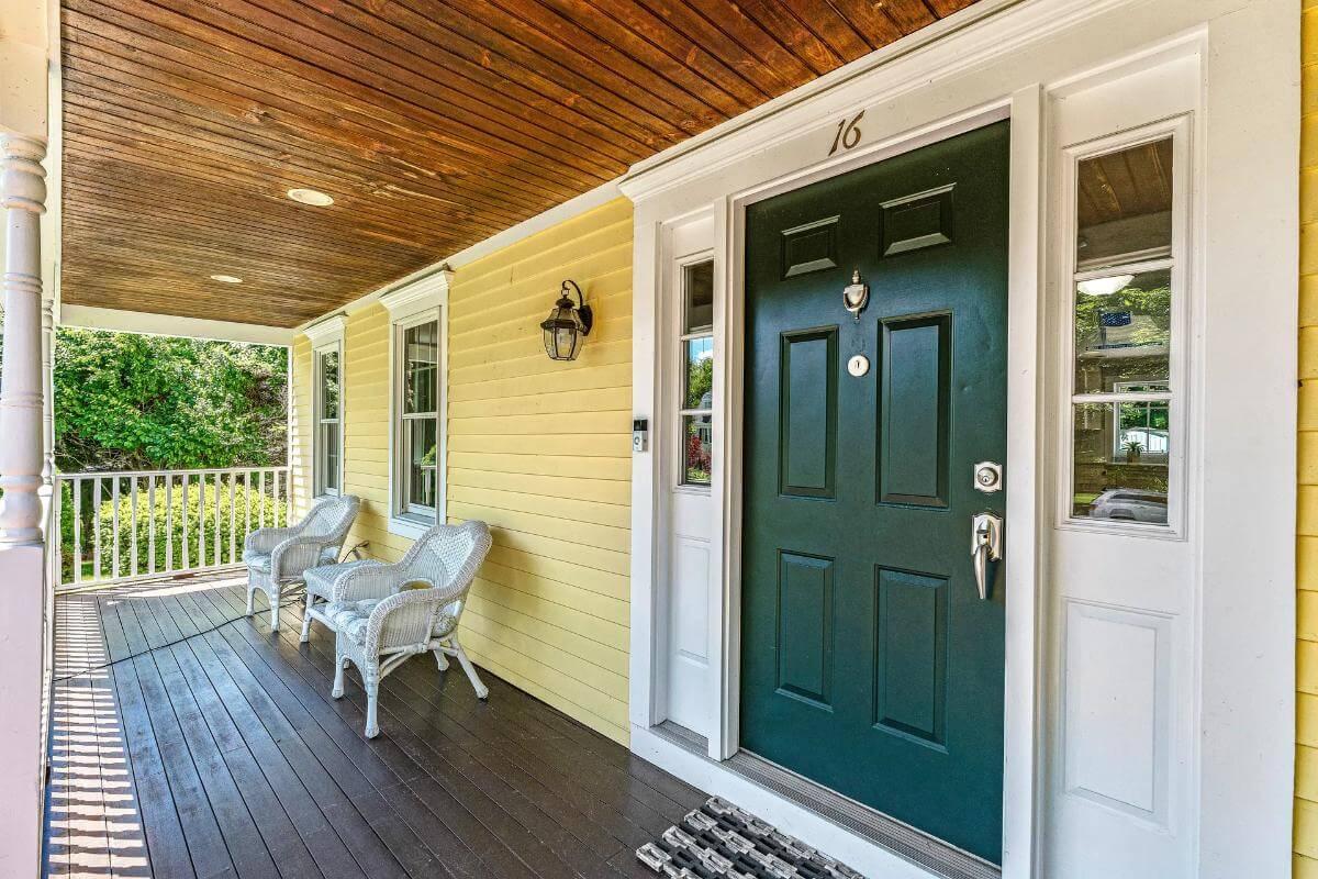 Unwind on the Craftsman-Style Front Porch with Wicker Seating