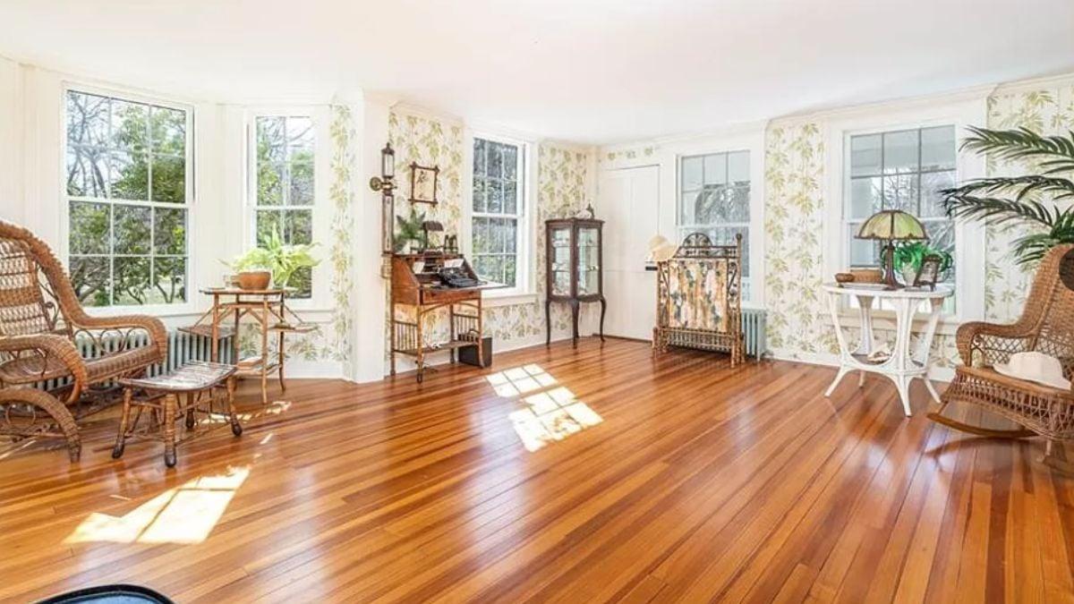 Sunroom Bliss with Vintage Flair and Hardwood Shine