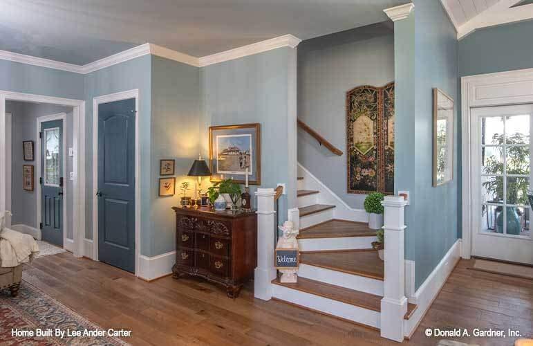 Notice the Elegant Craftsman Staircase with Rich Wooden Detailing