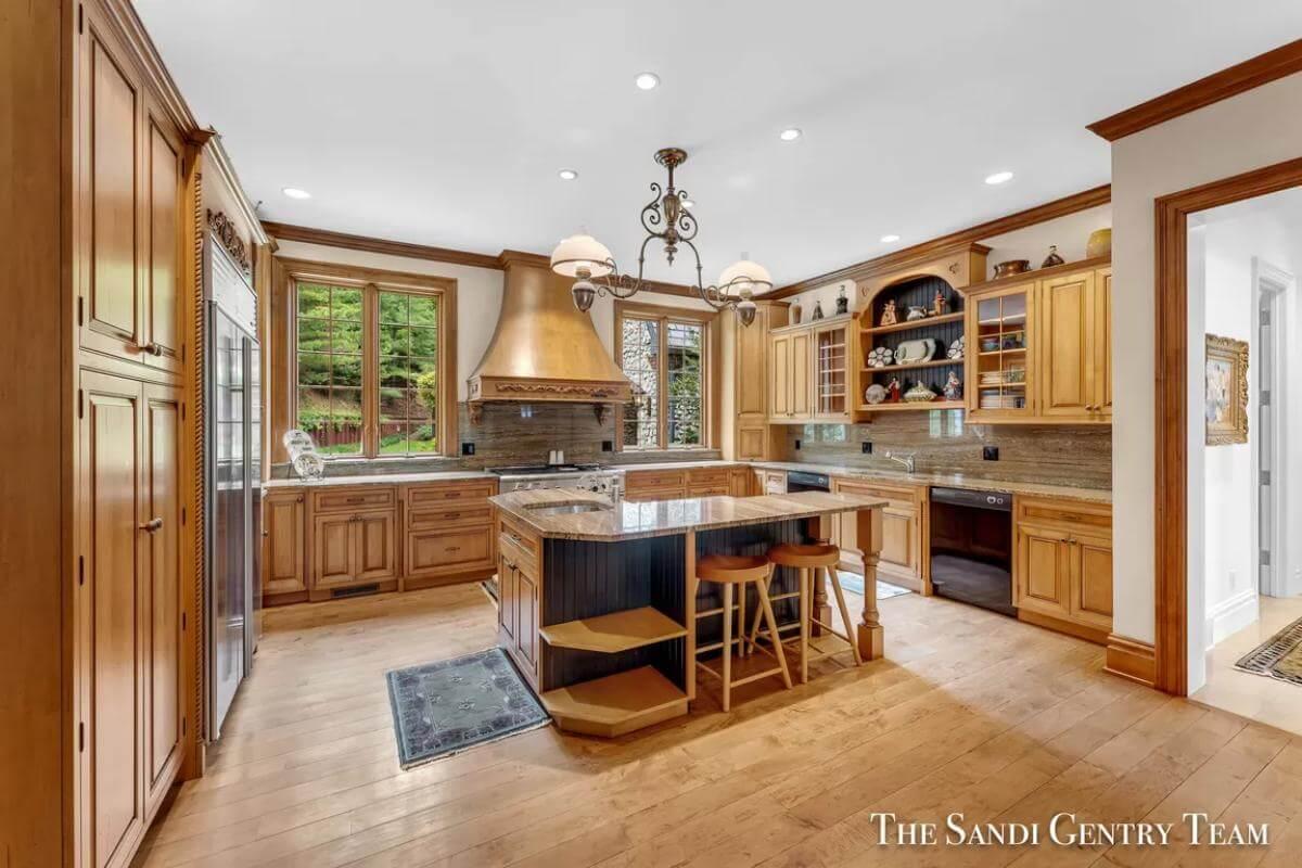 Wow, Check Out the Copper Hood and Warm Wood Cabinets in This Kitchen
