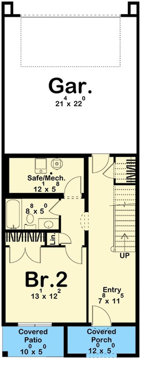 Ground Floor Plan Featuring a Spacious Garage and a Cozy Bedroom Suite