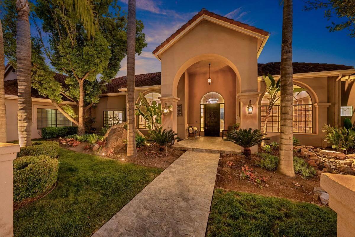 Step Into This Mediterranean Dream with an Inviting Arched Entry