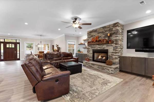Embrace the Warmth of a Stone Fireplace in This Craftsman Living Room