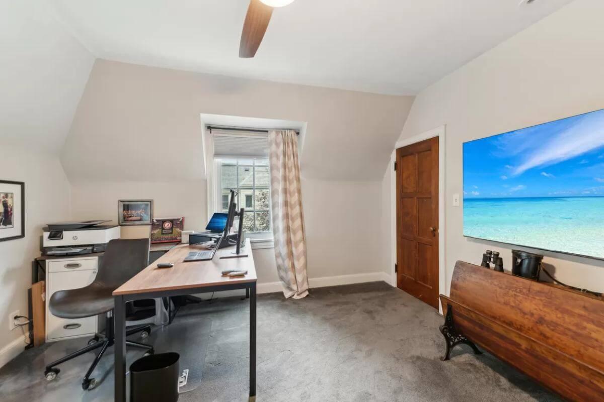 Efficient Home Office Setup with Wood Accents and Inspiring View