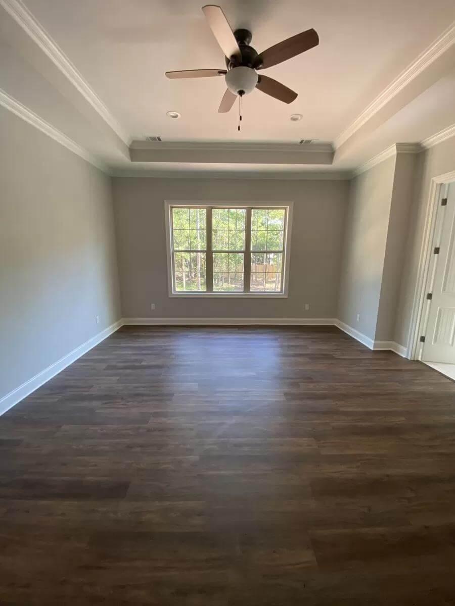 Sunlit Retreat with Tray Ceiling and Hardwood Floors