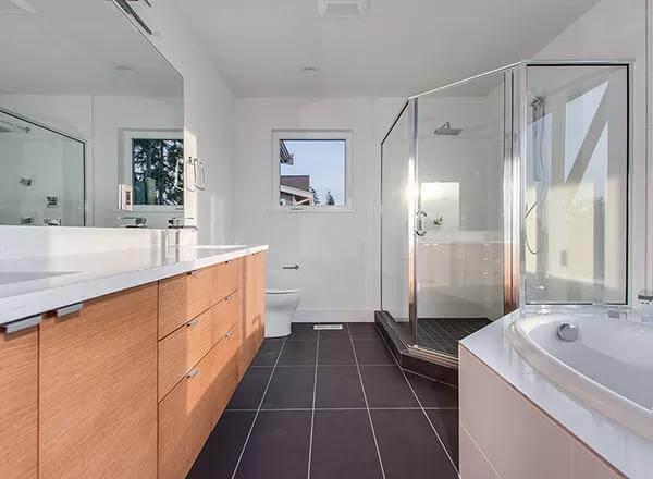 Notice the Glass Shower and Minimalist Bathtub in This Modern Bathroom