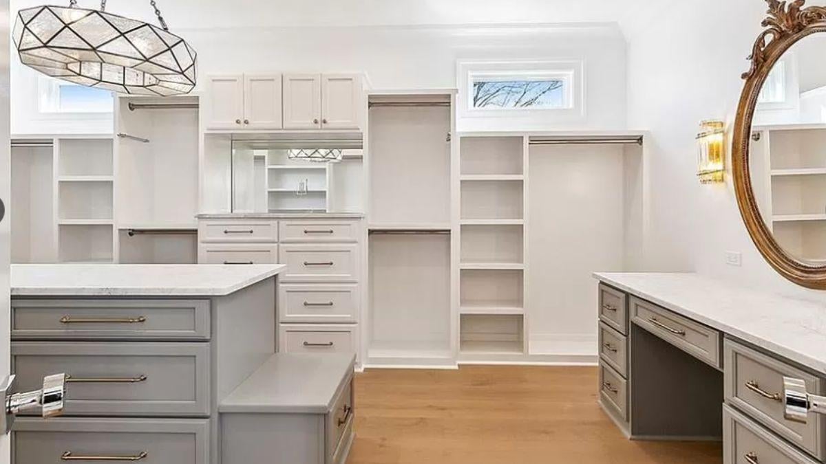 Step Into This Spacious Closet with Statement Lighting