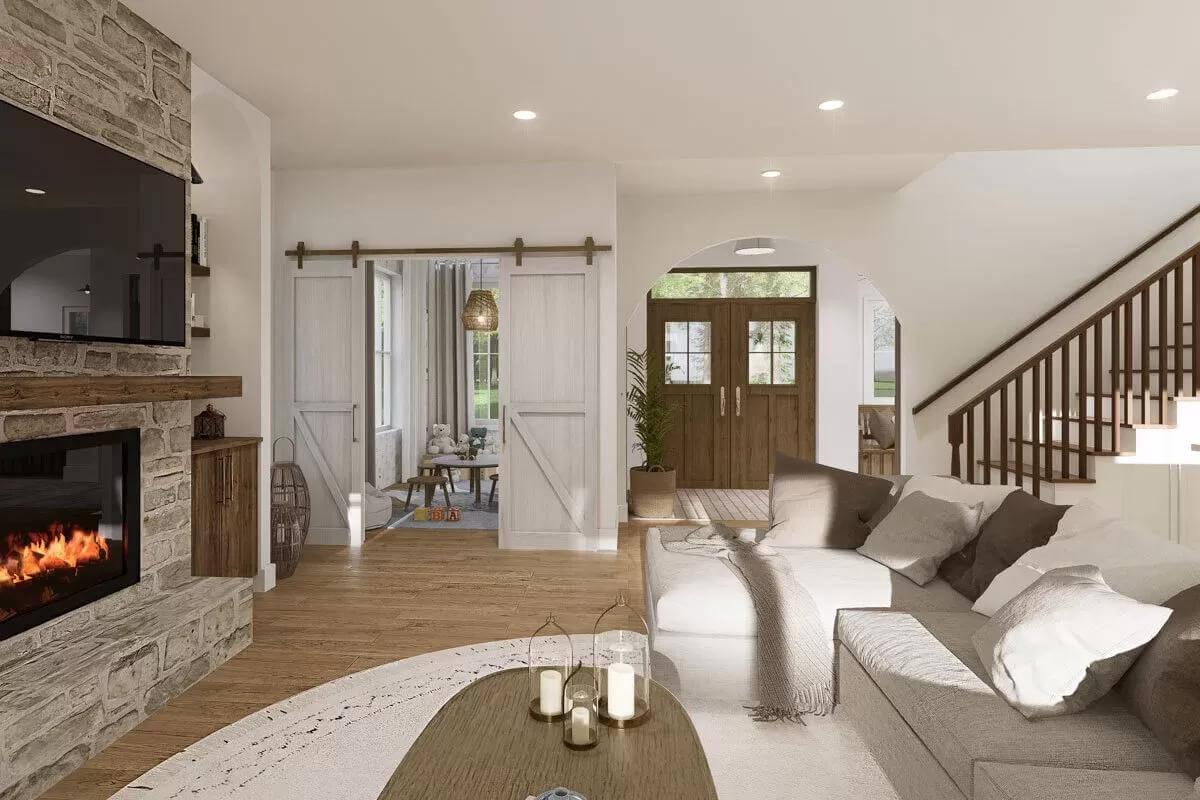 Embrace the Warmth: Stone Fireplace Sets the Tone in This Living Room