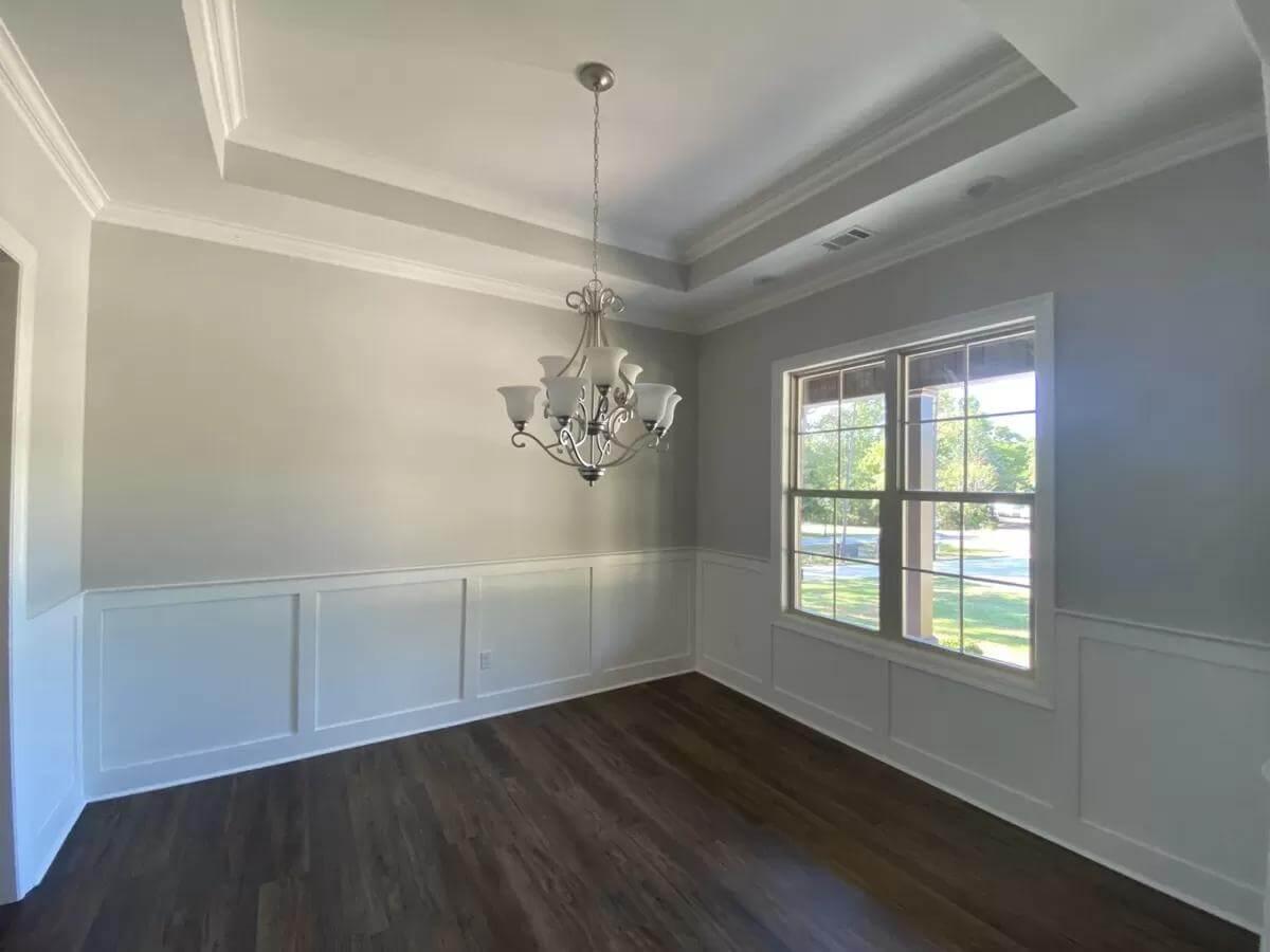 Classic Dining Room with Tray Ceiling Detail to Admire