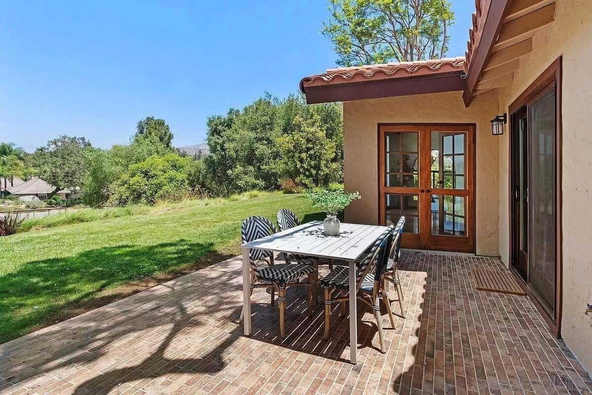 Enjoy the Brick Patio and French Doors Leading Outside