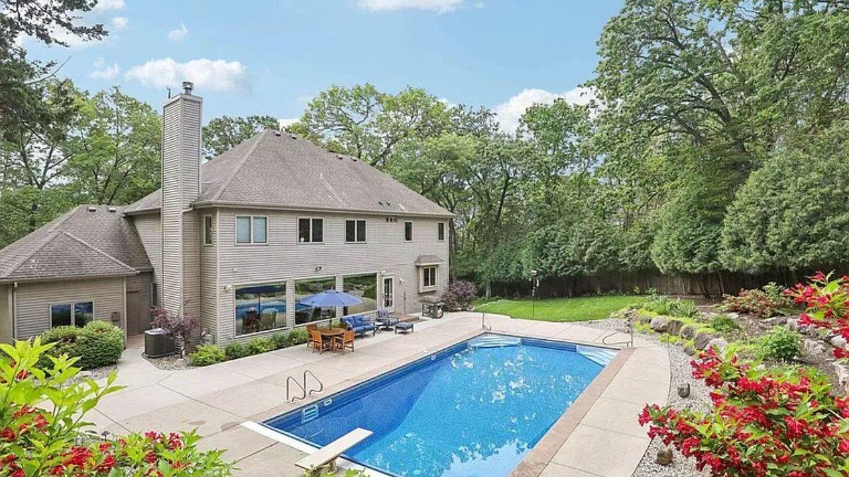 Dive Into Relaxation with This Backyard Pool and Patio