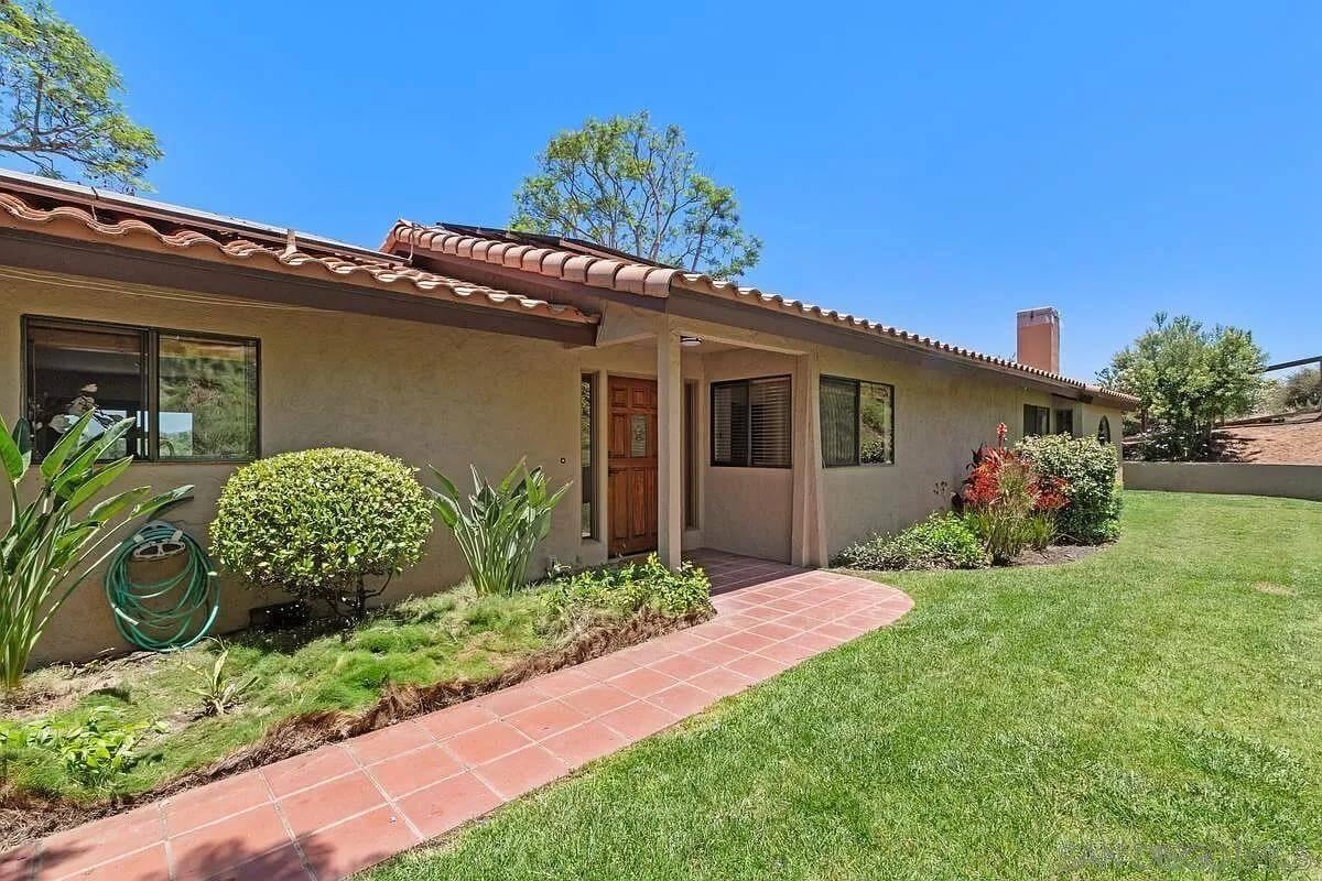 Check Out the Classic Terra Cotta Roof on This Ranch-Style Home