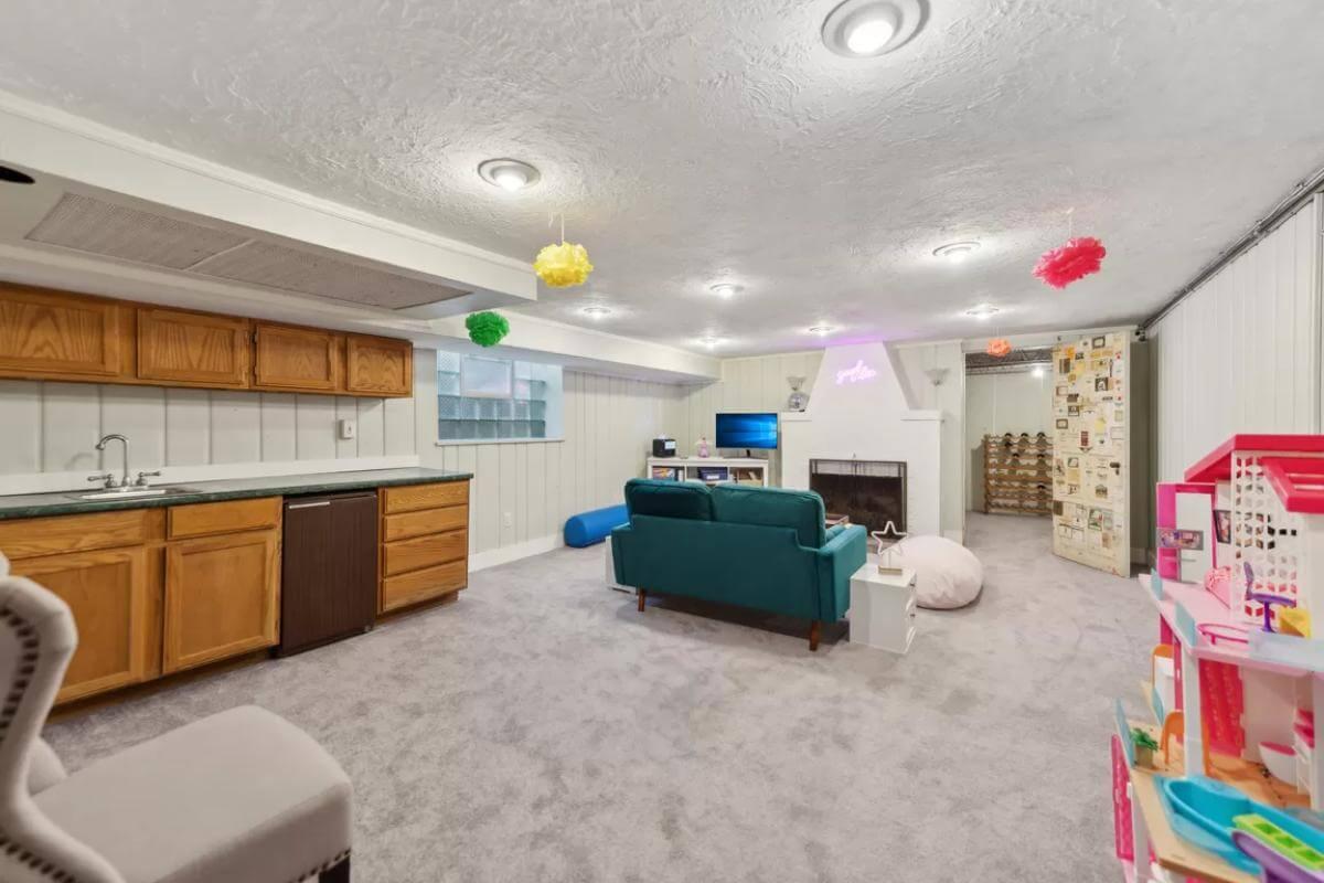 Explore This Versatile Basement with a Cozy Fireplace