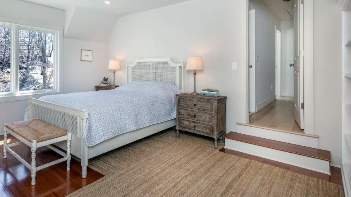 Step Into This Tranquil Bedroom With Raised Entryway