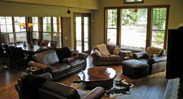 Relaxed Living Area with Leather Seating and a Nature View