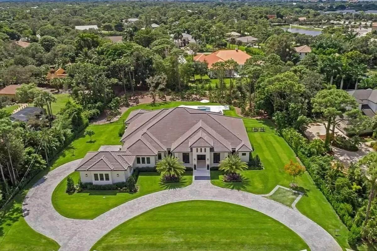 Wow, Look at the Expansive Lawn and Symmetrical Rooflines of This Estate