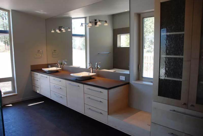 Modern Bathroom with Elegant Floating Vanity and Vessel Sinks