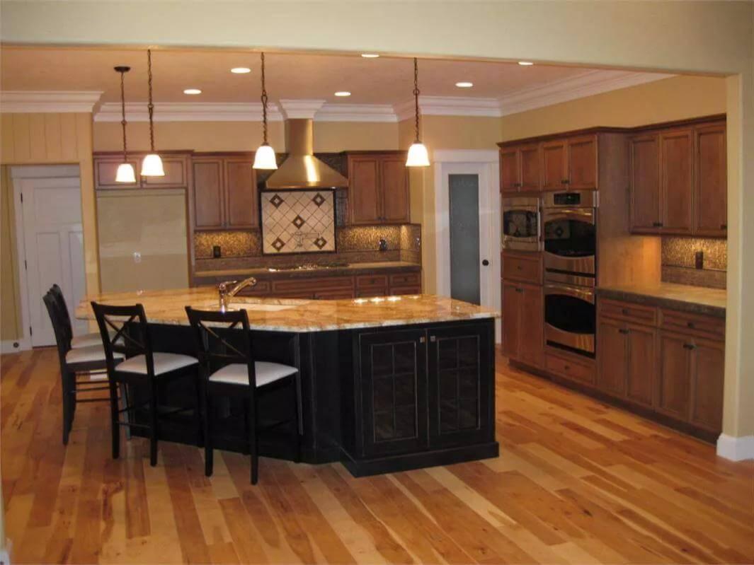 Check Out the Statement Granite Island in This Classic Kitchen