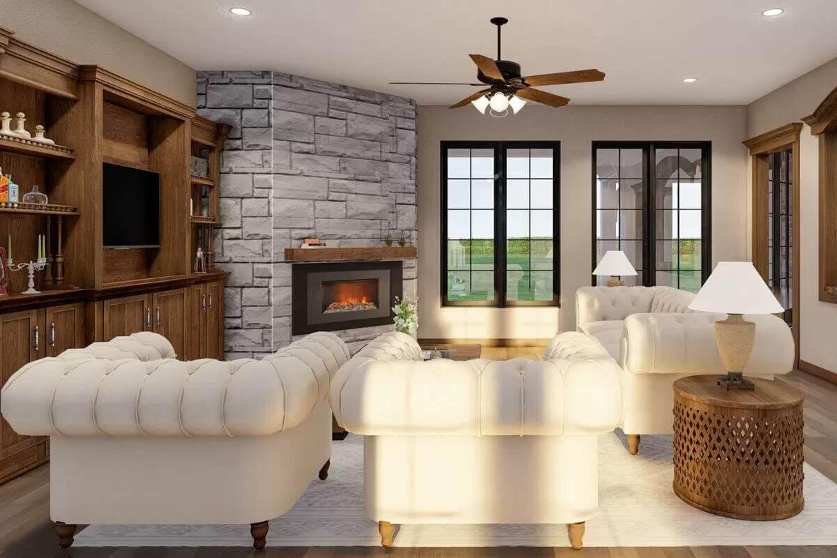 Take in the Stone Fireplace and Cozy Seating in This Living Room