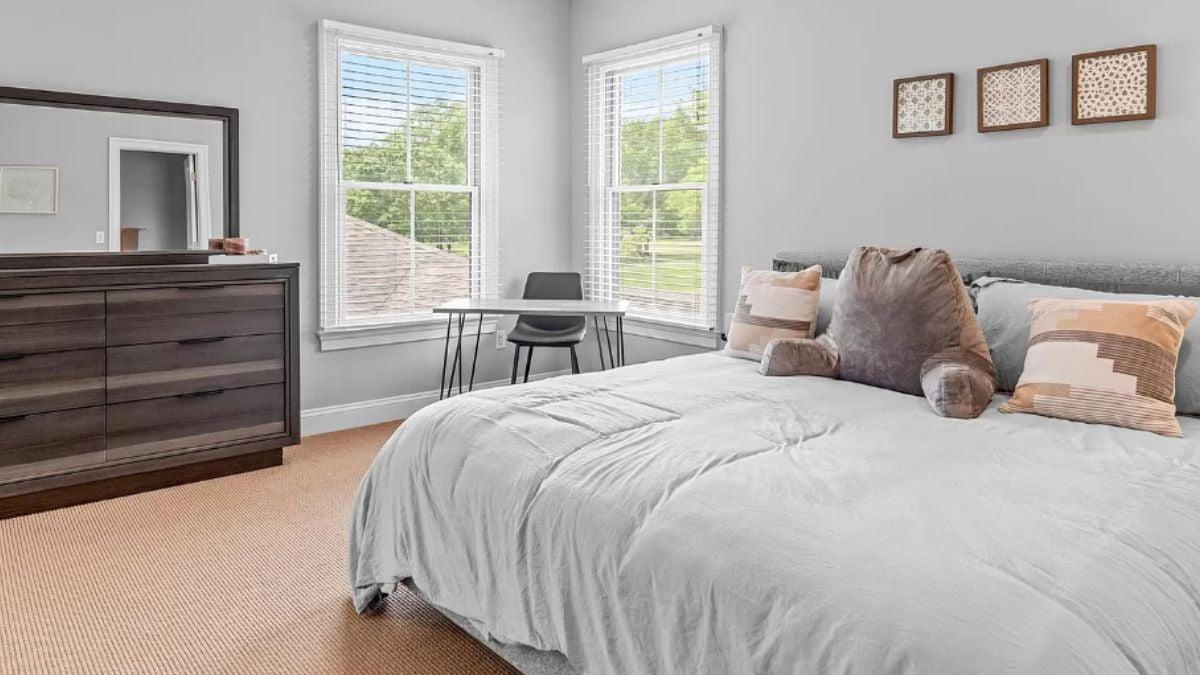 Bedroom with Soft Textures and a Cozy Study Nook