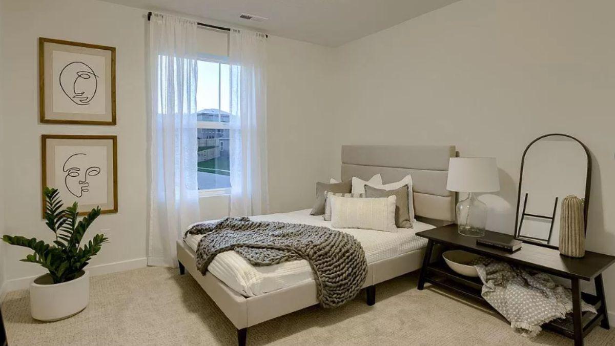 Relax in This Minimalist Bedroom with Soft Textures and Personal Touches