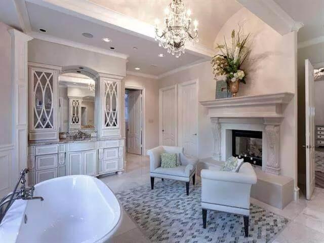 Wow, Look at the Elegant Fireplace and Grand Tub in This Spa-Like Bathroom
