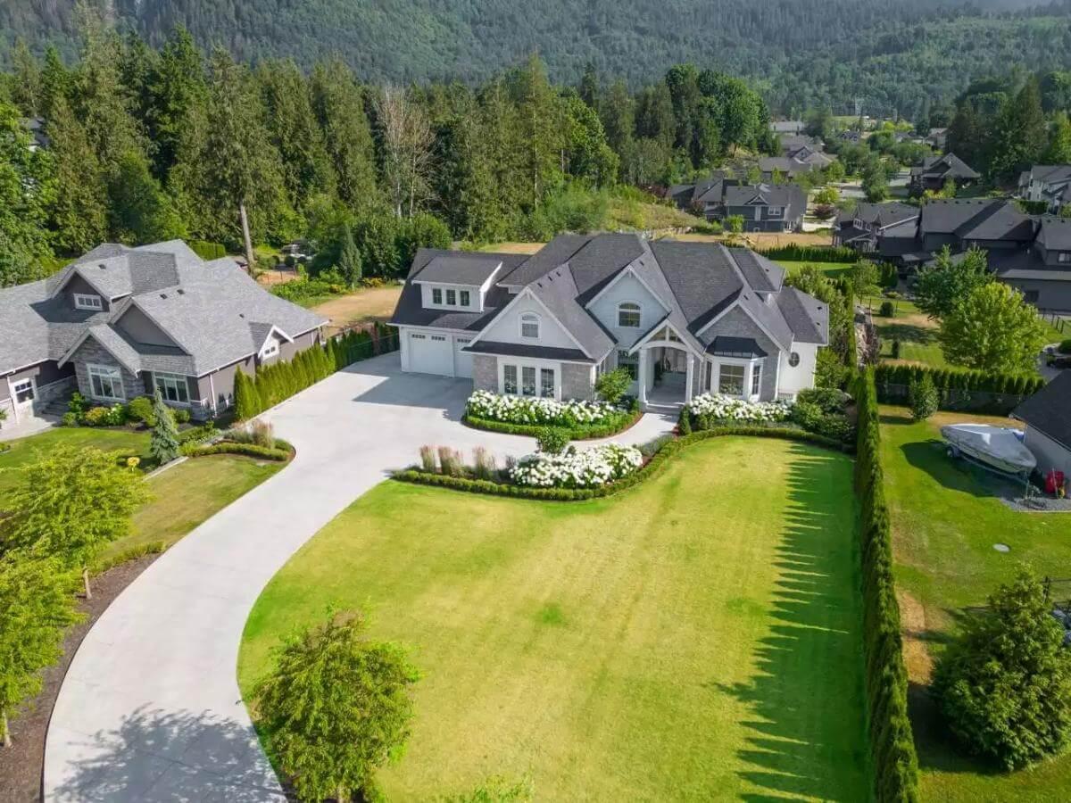 Explore the Sweeping Driveway Leading to This Enchanting Modern Craftsman Home