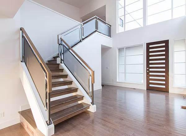Step Into This Modern Entryway with a Statement Staircase