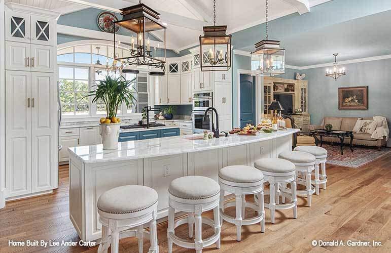 Gaze at the Oversized Kitchen Island with Lantern Lighting