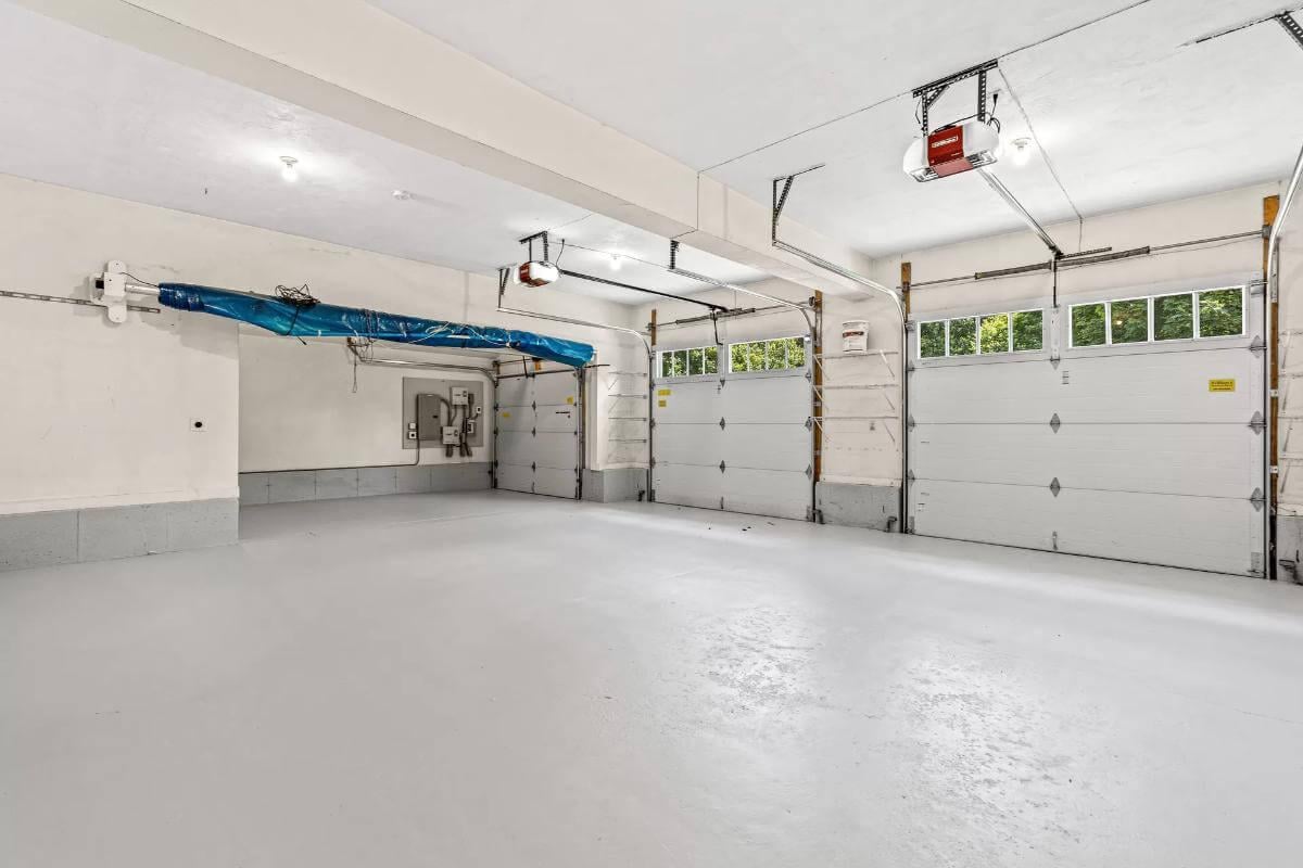 Explore the Expansive Three-Car Garage with Ample Storage