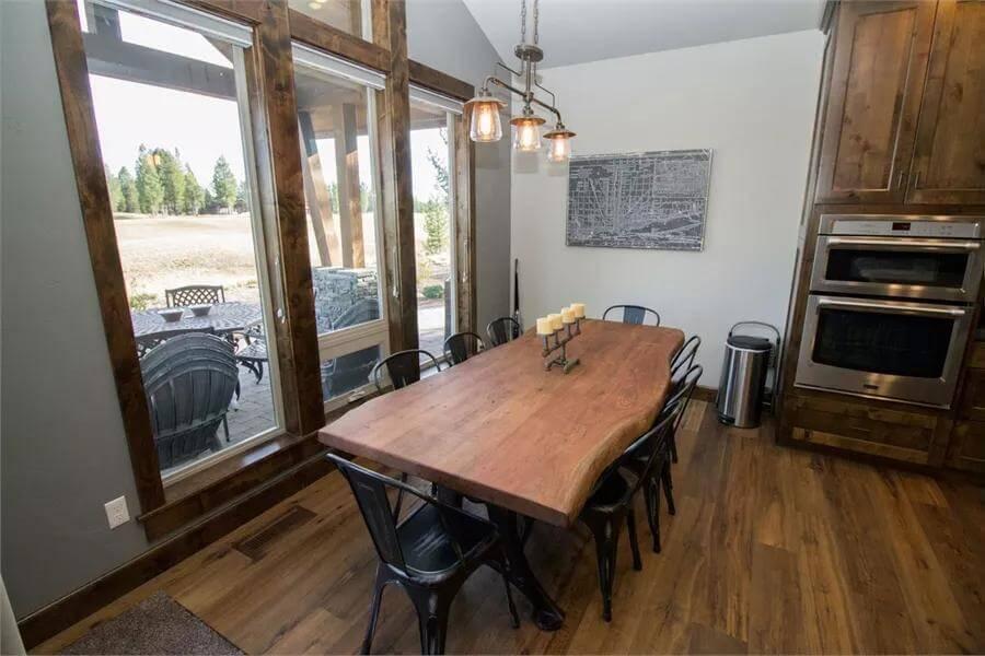 Notice the Live-Edge Table in This Craftsman Dining Area