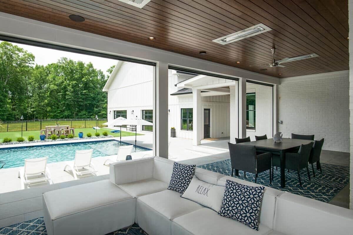 Relax in This Open-Air Lounge Overlooking a Sparkling Pool