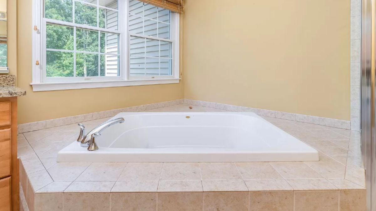 Step Into Relaxation with This Inviting Bathtub Alcove