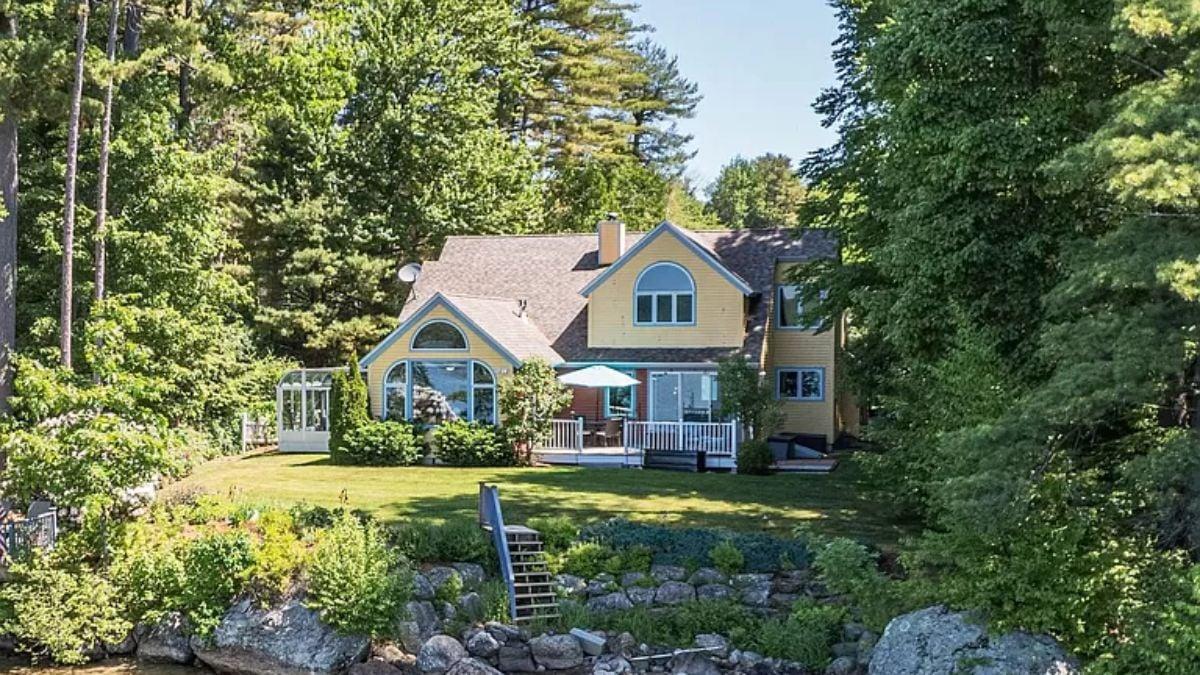 Craftsman Charm Nestled by Nature with a Sunny Yellow Exterior