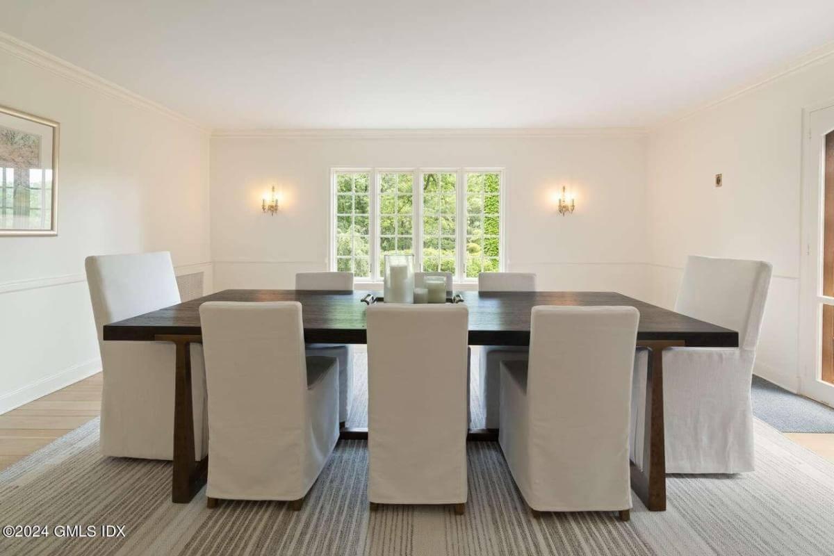 Enjoy the Simplicity in This Dining Room with Elegant Candle Centerpiece