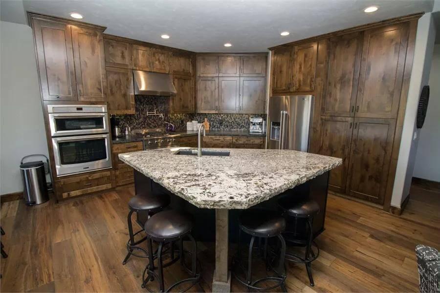 Wow, Take a Look at That Granite Island in This Craftsman Kitchen