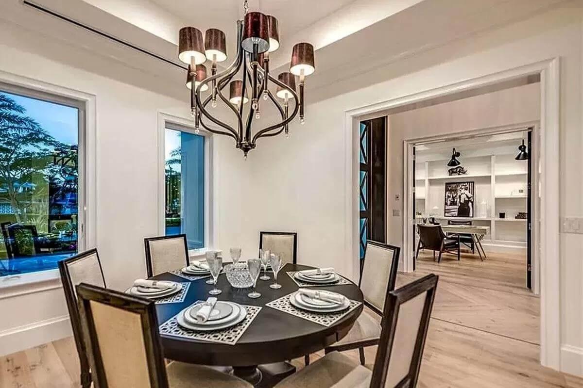 Notice the Elegant Chandelier in This Intimate Dining Space